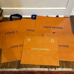 Louis Vuitton bundle of shopping bags
